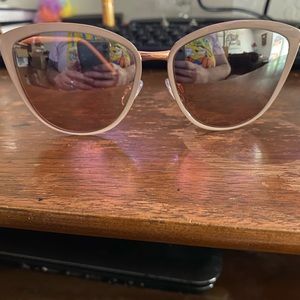 Pink rimmed sunglasses